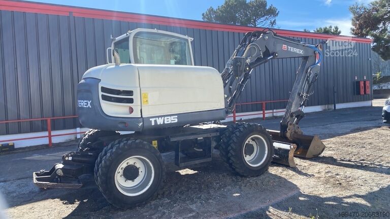 Riteņu ekskavators Terex Tw 85 Schaeff with 3 buckets and forks