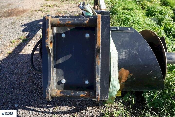Machine de chantier Digga BFT2 Chain digger w/ Combi attachment.