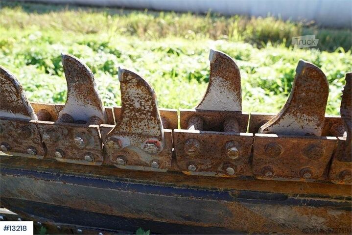 Machine de chantier Digga BFT2 Chain digger w/ Combi attachment.