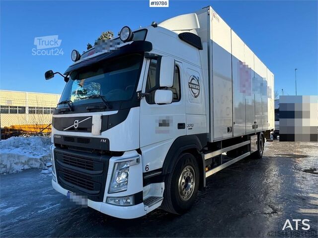 Box body Volvo FM370 box truck w/ full side opening and lift. WAT