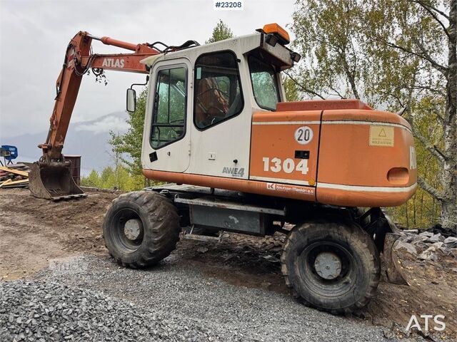 Wheel excavator Atlas 1304 w/ 1 backhoe bucket Low Hours!