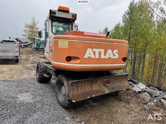 Wheel excavator Atlas 1304 w/ 1 backhoe bucket Low Hours!