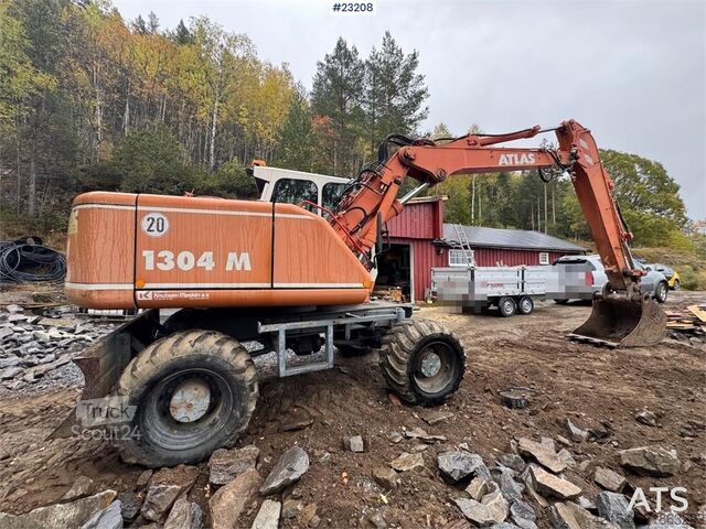 Wheel excavator Atlas 1304 w/ 1 backhoe bucket Low Hours!