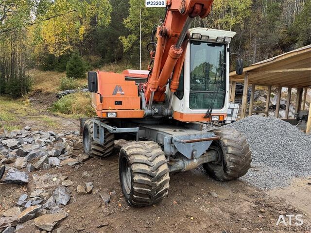 Wheel excavator Atlas 1304 w/ 1 backhoe bucket Low Hours!