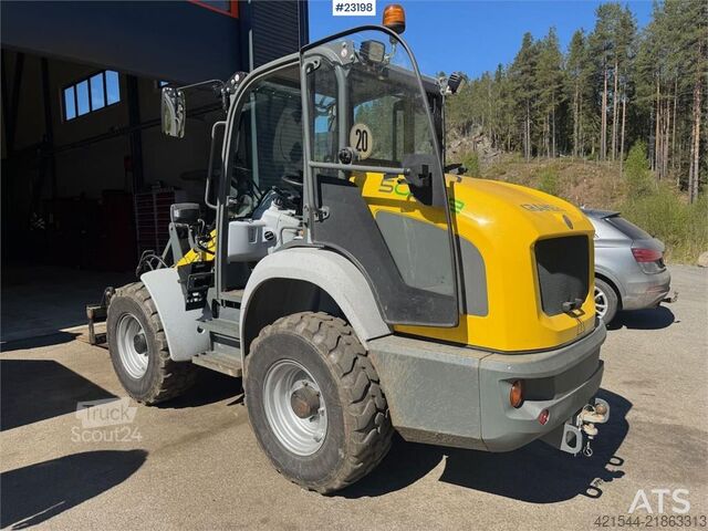 رافعة التحميل Kramer 5055E Wheel Loader with plow, pallet forks and 2 b
