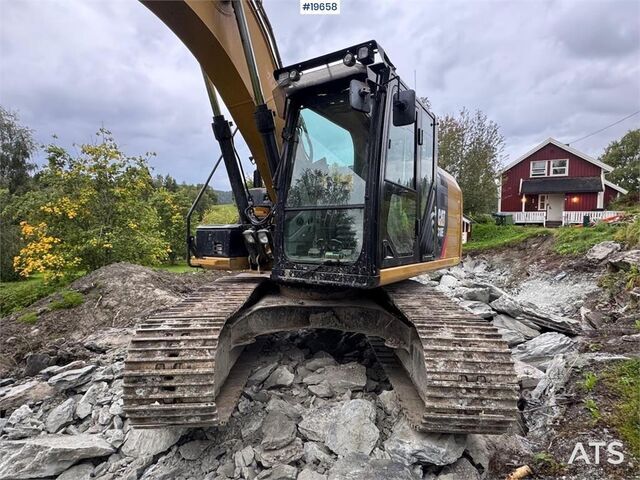 ķēžu ekskavators Caterpillar 318E