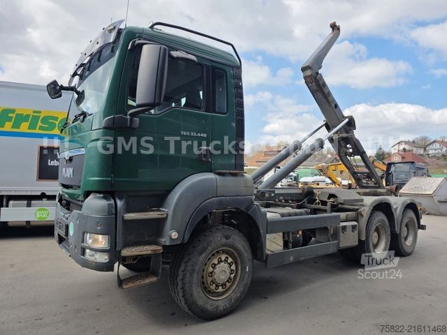Kanca kasalı yük kamyonu (roll-off) MAN TGS 33.440 / 6X6 Allrad / Meiller / Full Steel