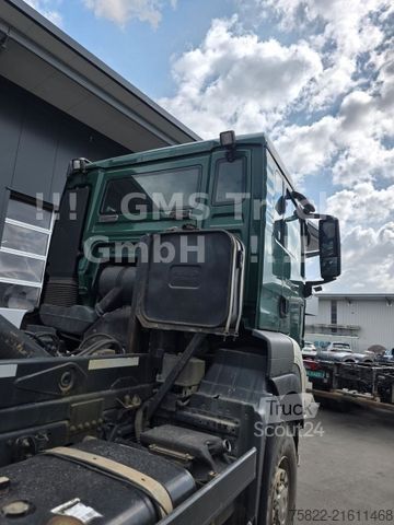 Kanca kasalı yük kamyonu (roll-off) MAN TGS 33.440 / 6X6 Allrad / Meiller / Full Steel