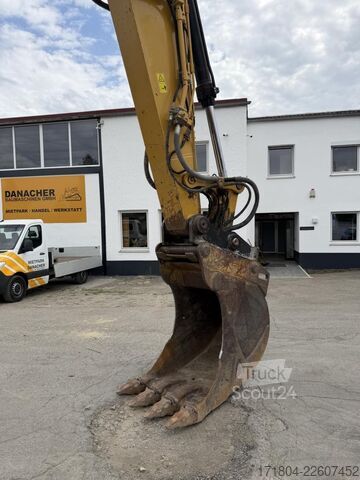 гусеничный экскаватор Caterpillar 323 FL