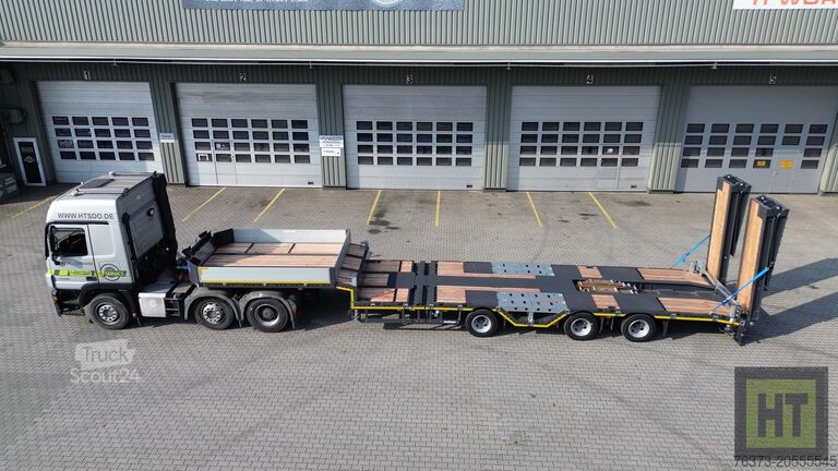 Semi-remorque surbaissée Meusburger 3-Achs-Tele-Semi-Radmulden-hydr. Rampen