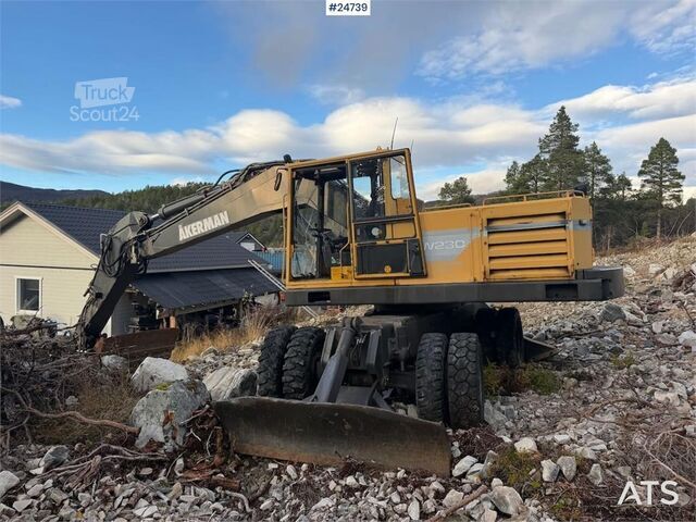  Åkerman EW230 wheeled excavator with two buckets and tiltr