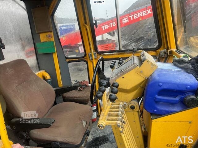 Tieranaura Caterpillar 140G grader. WATCH VIDEO