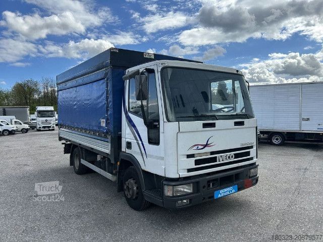 Camión plataforma con toldo IVECO ML65E14