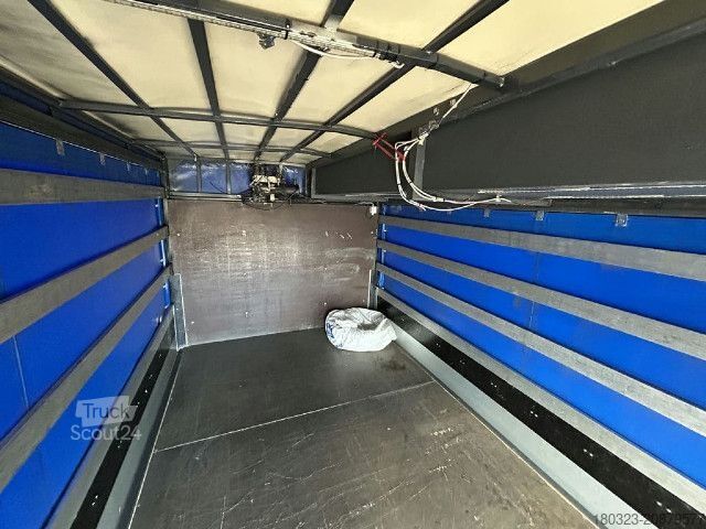 Camión plataforma con toldo IVECO ML65E14