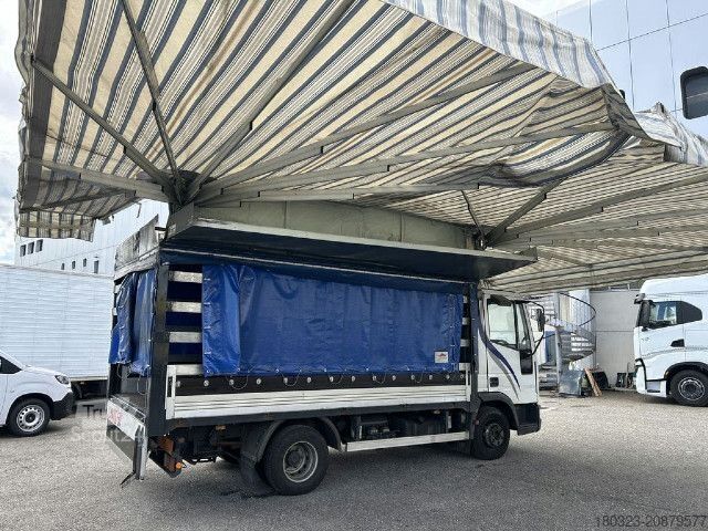 Camión plataforma con toldo IVECO ML65E14