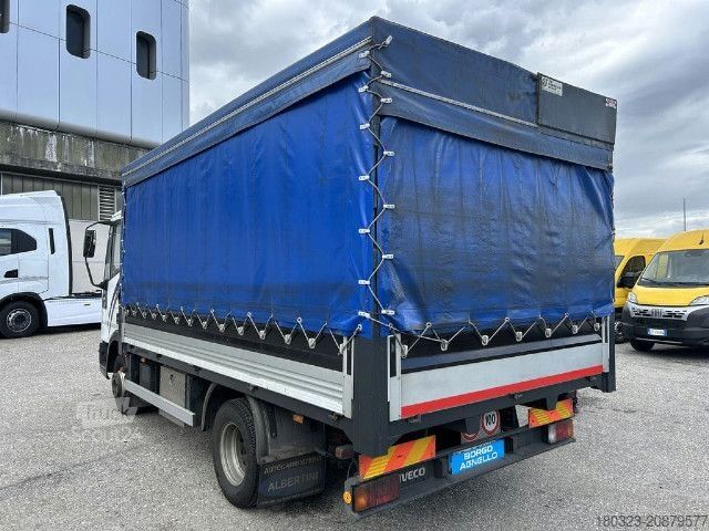Camión plataforma con toldo IVECO ML65E14