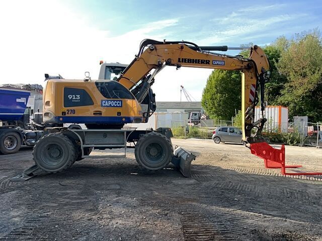 Escavatore gommato Liebherr A913 Compact Litronic with 3 excavator buckets