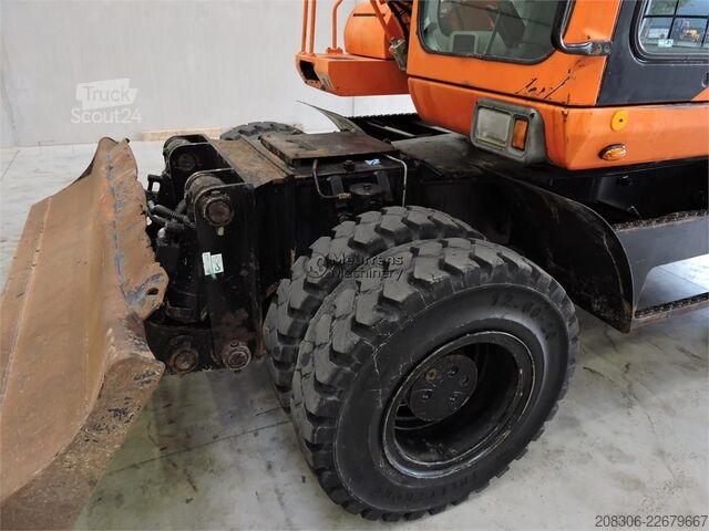 Pelle sur pneus DAEWOO S200W Belgium machine