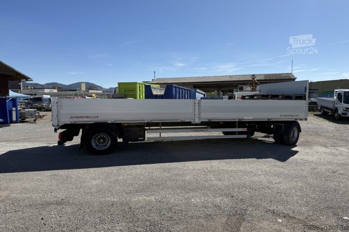 Відкритий причіп з тентом Schwarzmüller T-Serie Brücke / Swiss-Vehicle