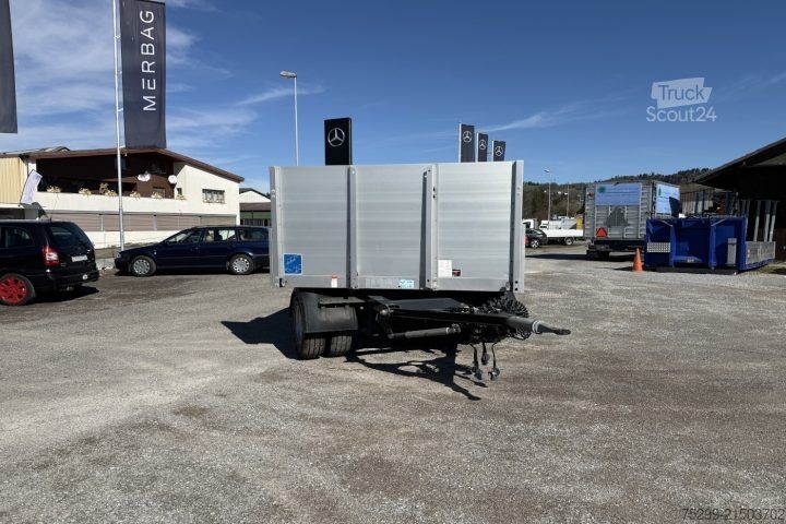 Відкритий причіп з тентом Schwarzmüller T-Serie Brücke / Swiss-Vehicle