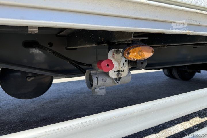 Відкритий причіп з тентом Schwarzmüller T-Serie Brücke / Swiss-Vehicle