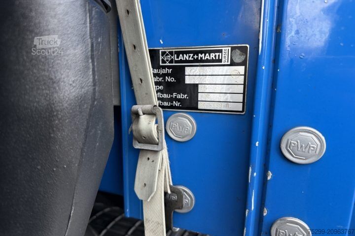 Camion cu platformă și prelată Renault D Wide 18.320 4x2 Plane/HB  / Swiss-Vehicle