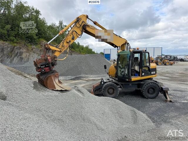 Tekerlekli ekskavatör Caterpillar M313C