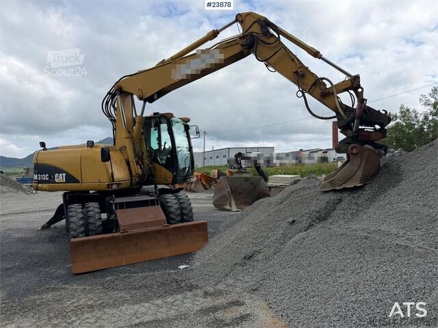 Tekerlekli ekskavatör Caterpillar M313C