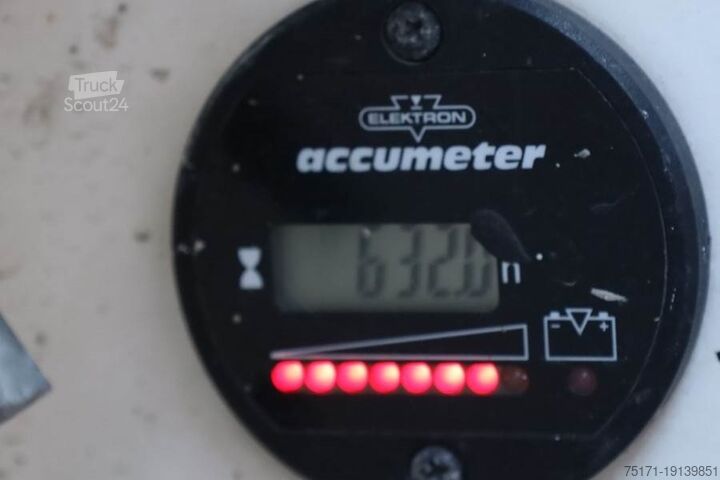 Scissor lift Holland Lift Ecostar HL-9710 Electric, 12m Working Height, 325k