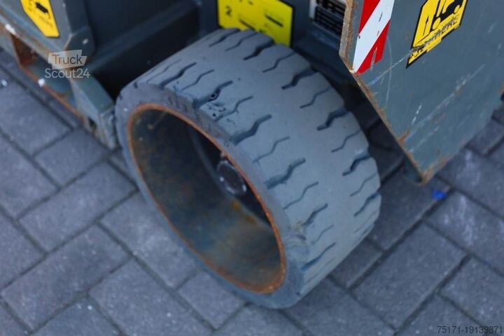 Scissor lift Holland Lift Ecostar HL-9710 Electric, 12m Working Height, 325k