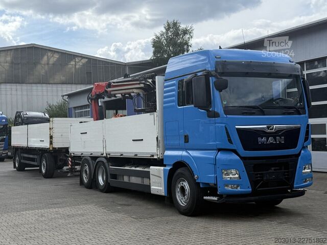 Camión de plataforma MAN TGX 26.470 Euro 6 Abrollkipper mit Ladekran
