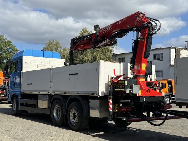 Camión de plataforma MAN TGX 26.470 Euro 6 Abrollkipper mit Ladekran