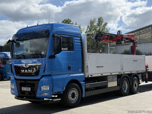 Camión de plataforma MAN TGX 26.470 Euro 6 Abrollkipper mit Ladekran