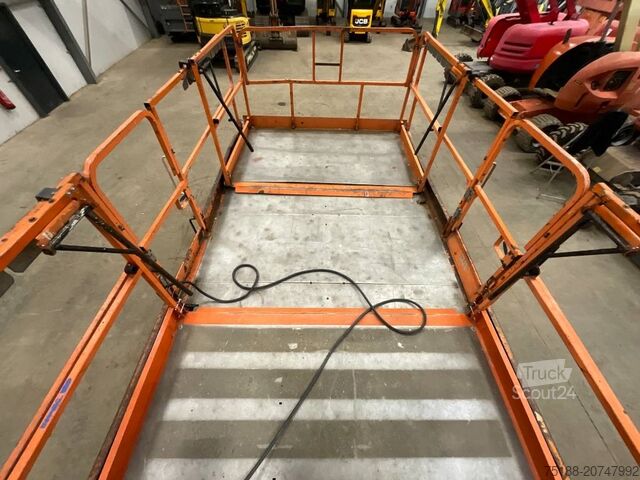 Elevador de tesoura JLG 3394 RT