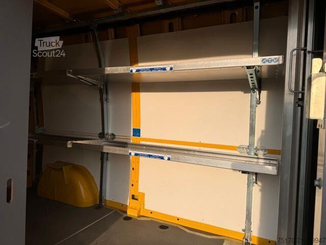 Hochdachkombi Mercedes-Benz eSprinter 312 DHL Regal KEP-Ausbau