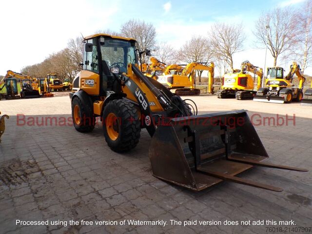 Radlader JCB 409 gebraucht Lader Baumaschine