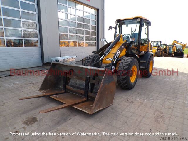 Radlader JCB 409 gebraucht Lader Baumaschine