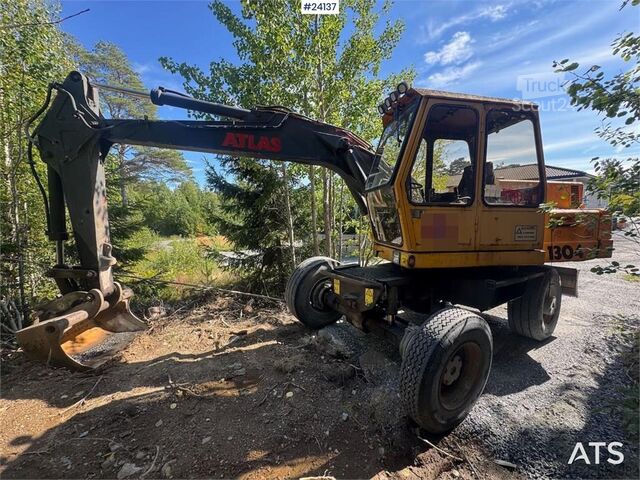 Pelle sur roues Atlas 1304 Wheeled Excavator – 2 Buckets