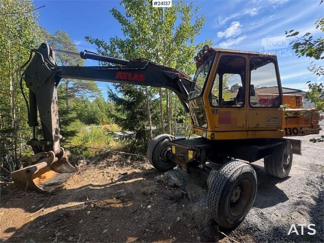 Pelle sur roues Atlas 1304 Wheeled Excavator – 2 Buckets